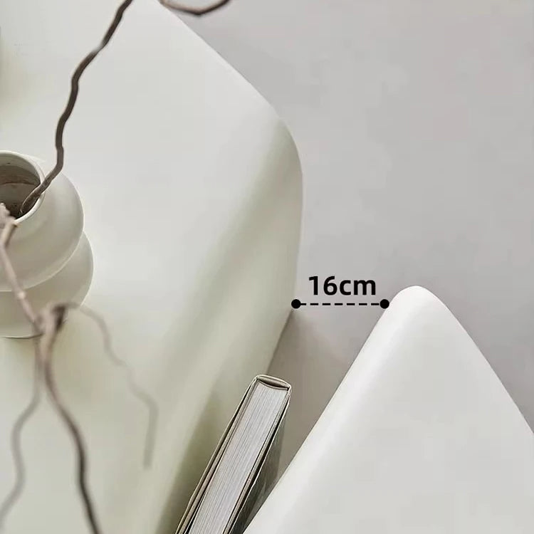 طاولة قهوة بتصميم منحني مميز