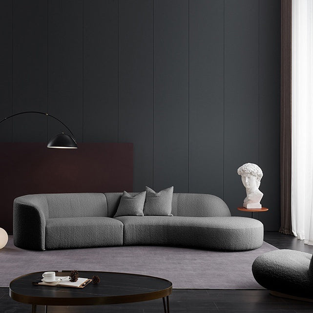 كنبة زاوية من القماش بتصميم منحني