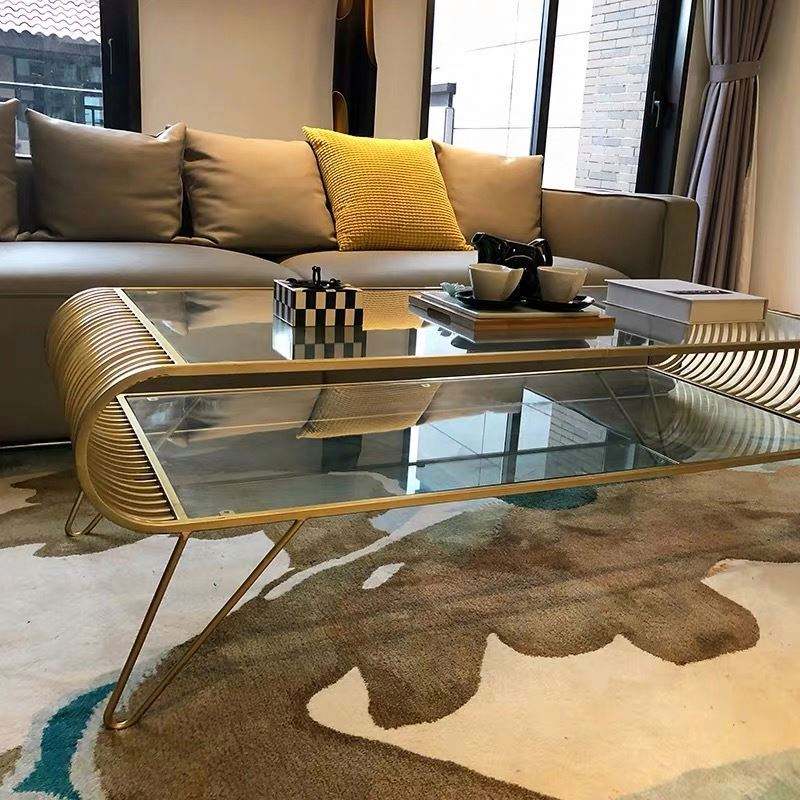 طاولة قهوة ذهبي بسطح زجاج