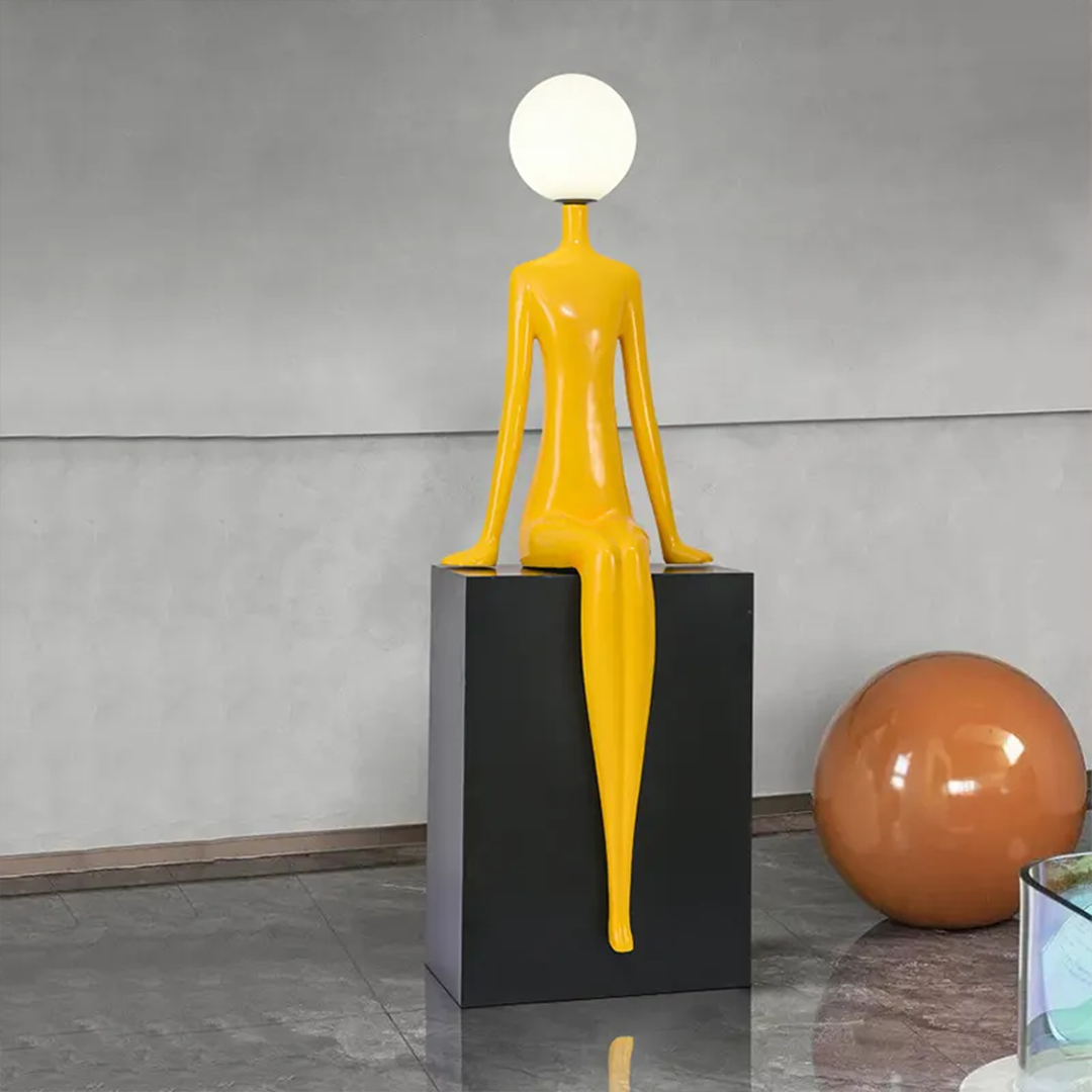 مصباح نحت من الألياف الزجاجية على شكل إنسان