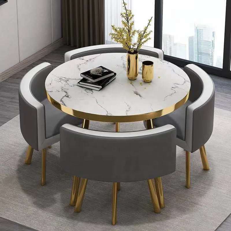 طاولة مستديرة بسطح رخام مع 4 كراسي تصميم عصري